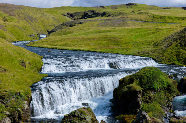 Typical Icelandic waterfall in summer - Zdjęcie, obraz