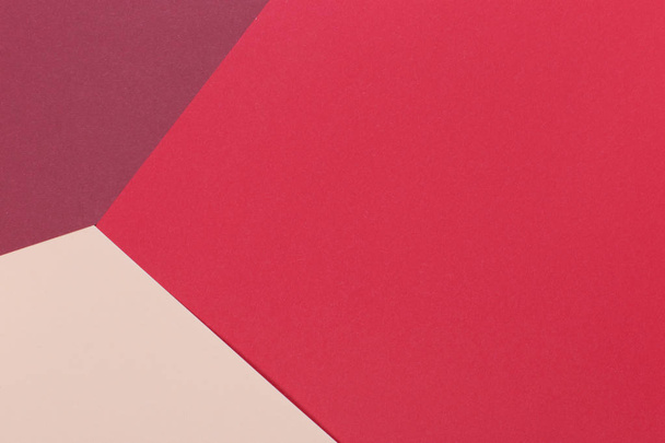 Paper light beige, burgundy, red empty background, geometrically located. Color blank for presentations, copy space. - Фото, зображення