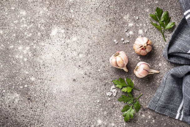 Fresh garlic on gray background - Fotó, kép