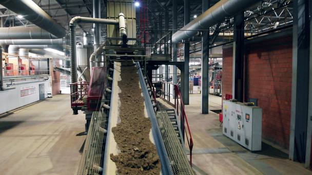 Crushed stone moving on a conveyor at a plant. - Footage, Video