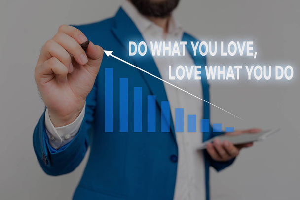 Writing note showing Do What You Love Love What You Do. Business photo showcasing you able doing stuff you enjoy it to work in better places then Male wear formal work suit presenting presentation - Photo, Image