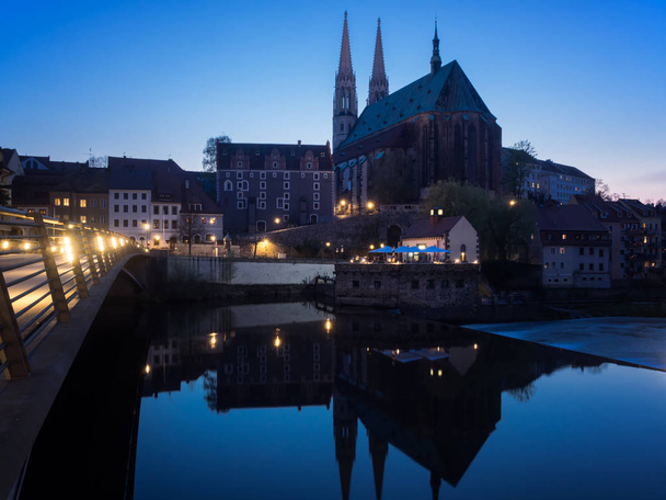 Goerlitz, Saxony, Germany - 2018/04/17: cityscape with St. Peter and Paul church at Blue hour - Photo, image