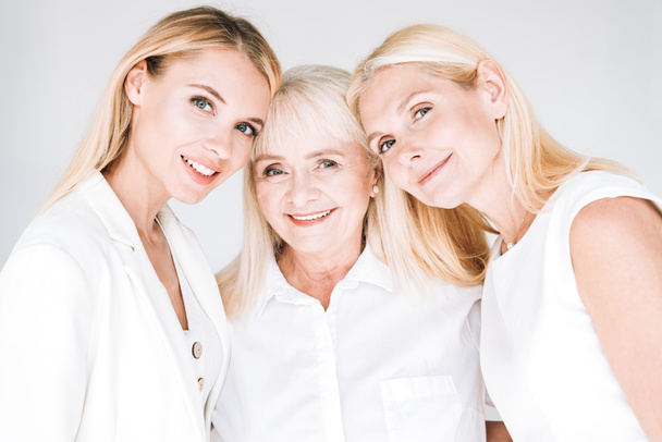 tres generación rubia hermosa mujeres aisladas en gris
 - Foto, Imagen