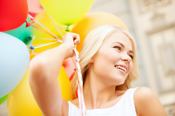 Woman with colorful balloons - Фото, изображение