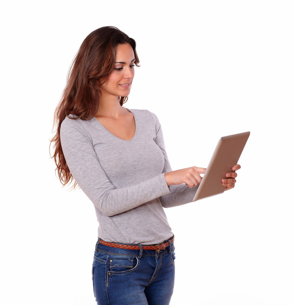 Lovely hispanic woman working on tablet pc - Фото, изображение