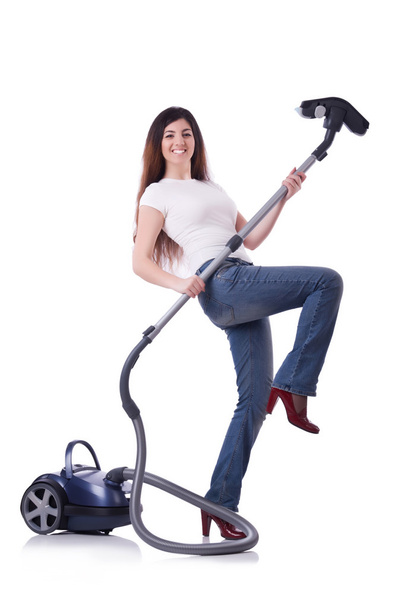 Young woman with vacuum cleaner on white - Foto, Imagen