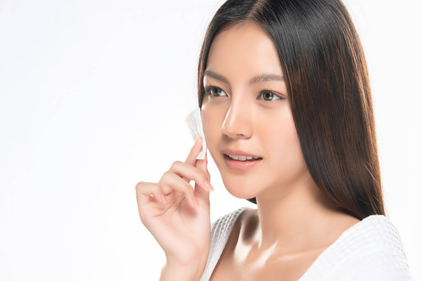 skin care woman removing face makeup with cotton swab pad., - 写真・画像