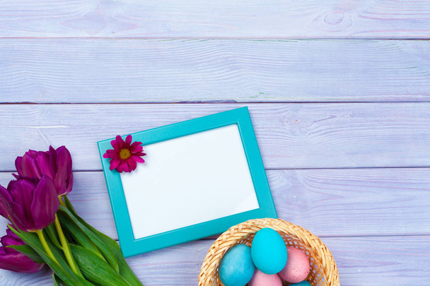 Easter background with tulips, eggs . Top view with copy space - Foto, imagen