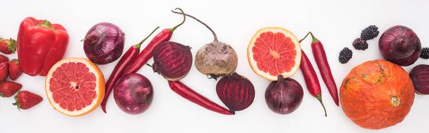 panoramic shot of onions, beetroots, grapefruits, peppers, pumpkin and berries on white background - Photo, Image