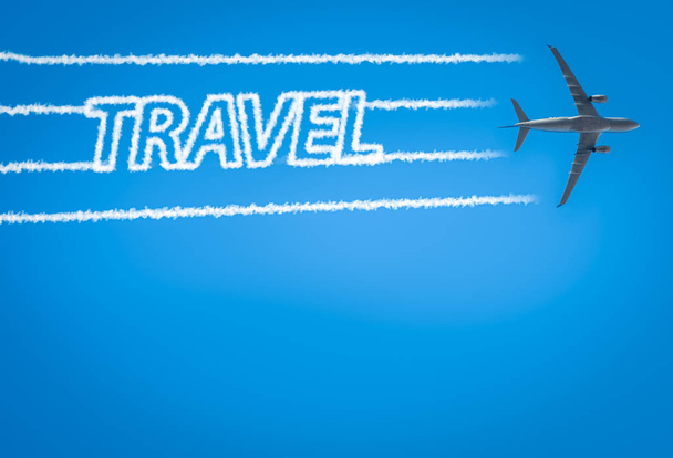 Airplane leaving jet contrails with Travel word inside - Photo, Image