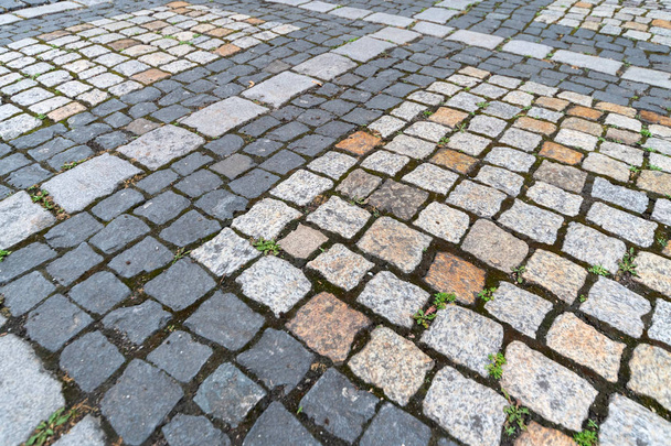 Texture piastrelle. Modello di ciottoli tedeschi antichi in città centro. Pietre da pavimentazione in granito. Pavimenti grigi antichi
. - Foto, immagini