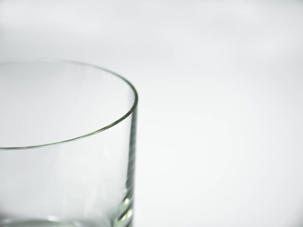 Empty glass on the white background - Photo, Image