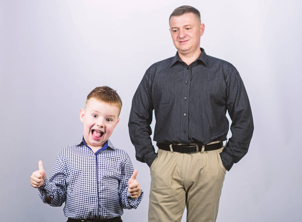 Father and cheerful little son. Best friends. Dad and adorable child. Father example of noble human. Family support. Family bonds. Trustful relations father and son. Enjoying fatherhood. Fathers day - Фото, зображення