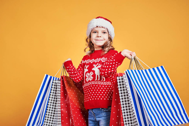 Cute girl with Christmas presents - Photo, image