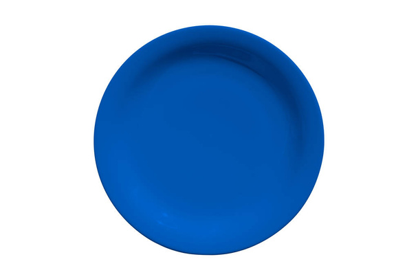 Plaque ronde en céramique bleue isolée sur fond blanc
 - Photo, image