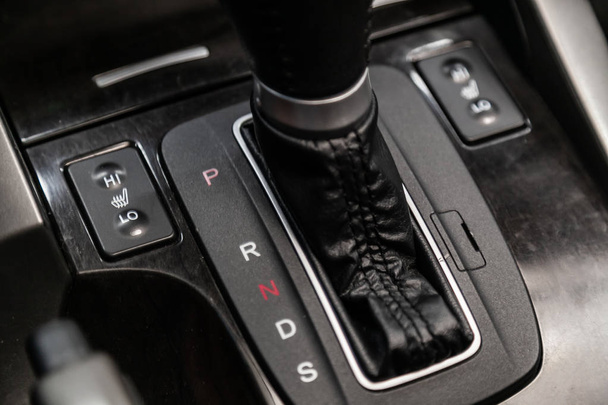 Novosibirsk, Russia  August 19, 2019: Honda Accord,  close-up of the accelerator handle and seat heatting buttons. automatic transmission gear of car , car interior - Fotografie, Obrázek