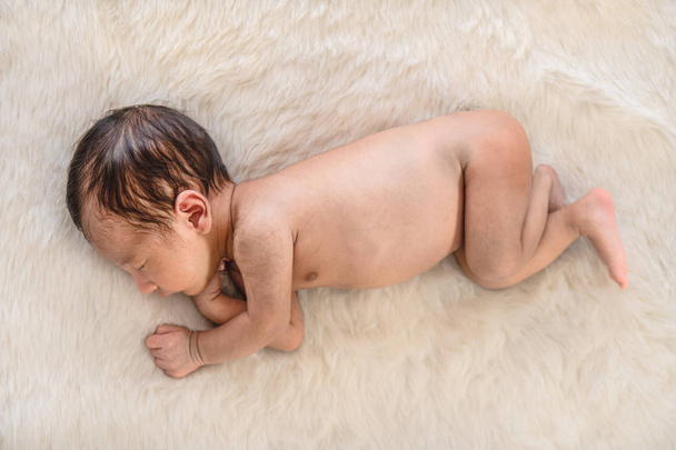 soft focused cute Asian infant baby boy sleeping on a blanket - Photo, Image