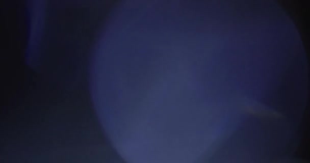 Stüdyoda Siyah Arkaplan Üzerine Gerçek Lens Fişeği Çekimi - Video, Çekim