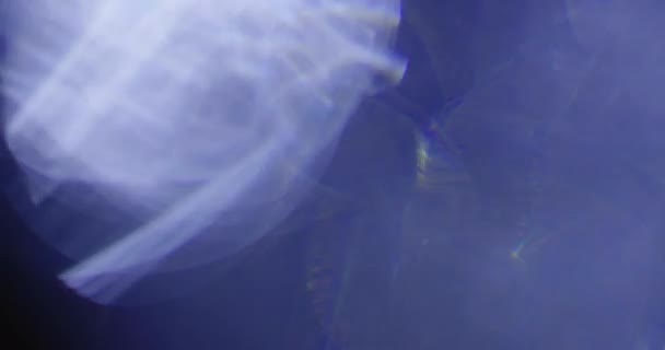 Real Lens Flare Shot in Studio over Black Background - Footage, Video
