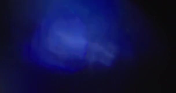 Real objektiv světlice pořízena ve studiu nad černým pozadím - Záběry, video