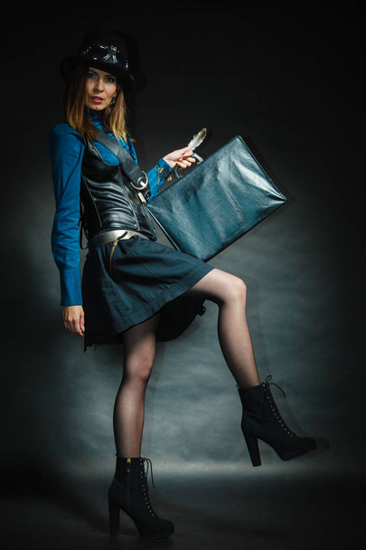 Steampunk girl with retro bag. - Foto, Imagen