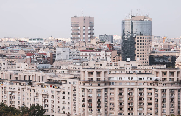 Cityscape of old part of Bucharest, with many worn out buildings - Photo, Image