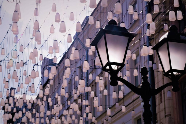 decorations pendant lanterns , pedestrian street view. stoleshnikov  strit - Zdjęcie, obraz