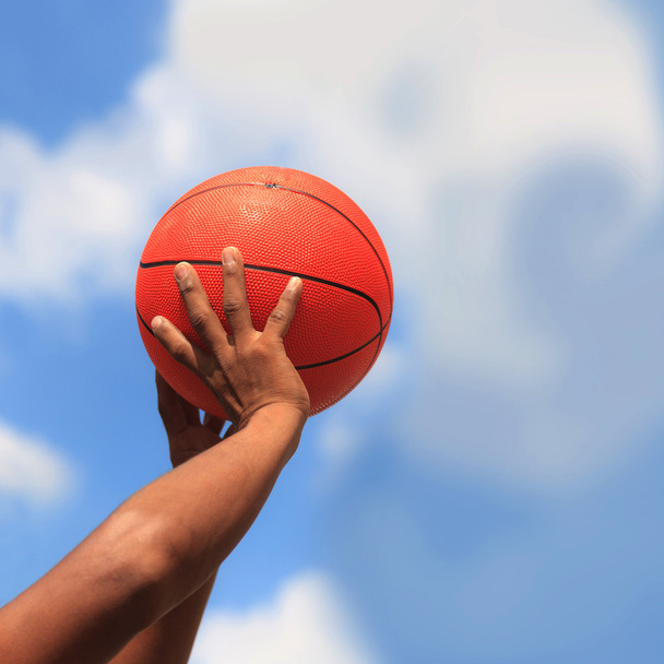 Basketball in hands - Photo, Image