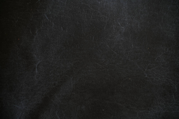 Genuine black cowhide leather background - Zdjęcie, obraz