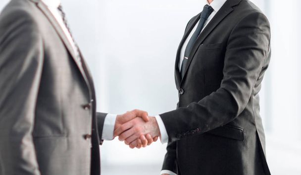 friendly handshake of business partners - 写真・画像