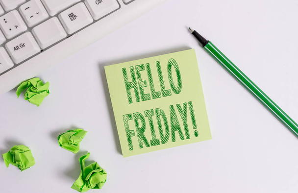 Conceptual hand writing showing Hello Friday. Business photo text you say this for wishing and hoping another good lovely week Green note paper with pencil on white background and pc keyboard. - Zdjęcie, obraz
