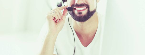 Businessman in the office on the phone with headset, Skype - Foto, imagen