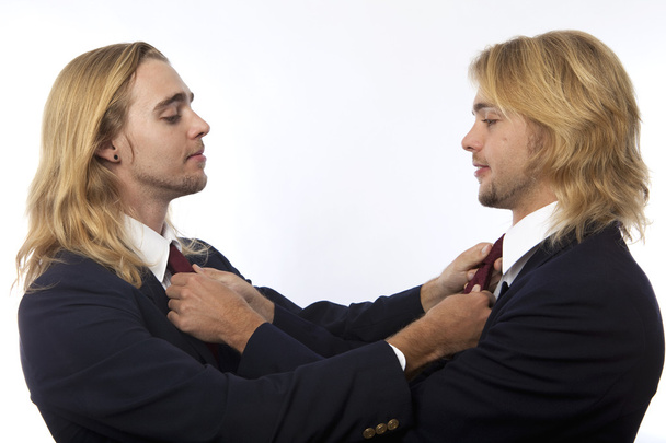 Twin brothers straightening their ties - Fotoğraf, Görsel