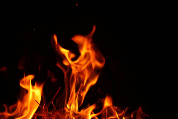 Blurred background. Fire flames pattern on black. - Photo, Image