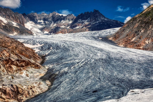 panorama of melting rhone glacier in swiss alps - 写真・画像