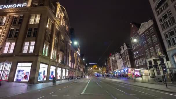Amsterdam město noční čas osvětlený centrální dopravní ulice Panorama 4 k timuplynout Nizozemsko - Záběry, video