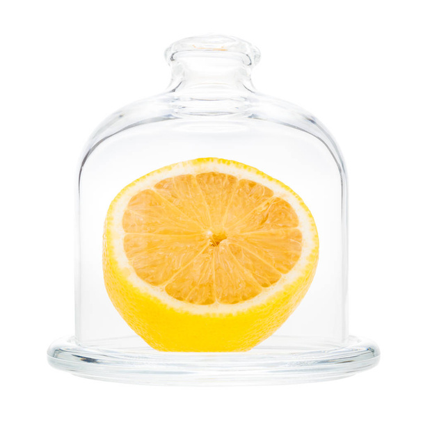 side view of halved lemon in Glass Lemon Keepe - Zdjęcie, obraz