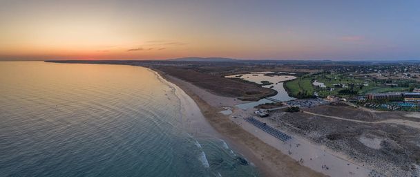 Aerial sunset seascape of Salgados beach in Albufeira, Algarve tourism destination region, Portugal. - Photo, image