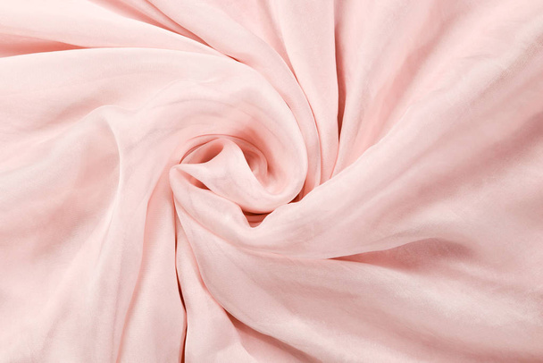 Soft smooth pink silk fabric background. Fabric texture.  - Fotografie, Obrázek
