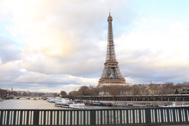Beautiful sky over the Eiffel tower and river seine, Paris capital and the most populous city of France - Φωτογραφία, εικόνα