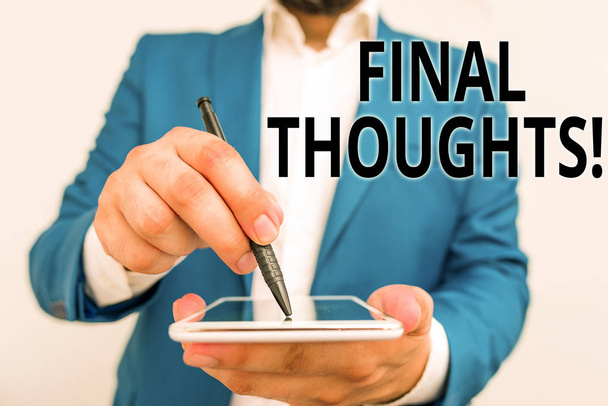 Conceptual hand writing showing Final Thoughts. Business photo showcasing should be last few sentences within your conclusions Businessman in blue suite with laptop pointing with finger. - Zdjęcie, obraz