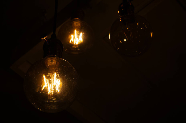 Yellow light bulbs in retro style close up - Fotoğraf, Görsel