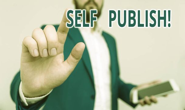 Conceptual hand writing showing Self Publish. Business photo showcasing writer publish piece of ones work independently at own expense Businessman pointing with pen in empty copy space. - Photo, Image