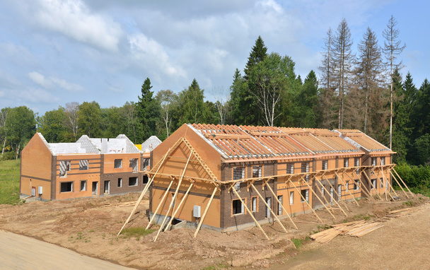 brick site under construction with wooden roof - Photo, Image