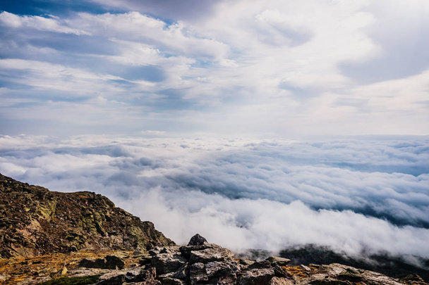 Beautiful view from the top of a mountain of a sea of clouds. - Photo, Image