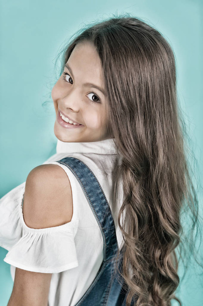 Kid model with long healthy brunette hair - Photo, Image