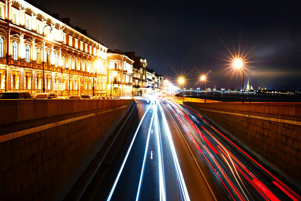 traffic in city at night in faded light - Foto, Imagem