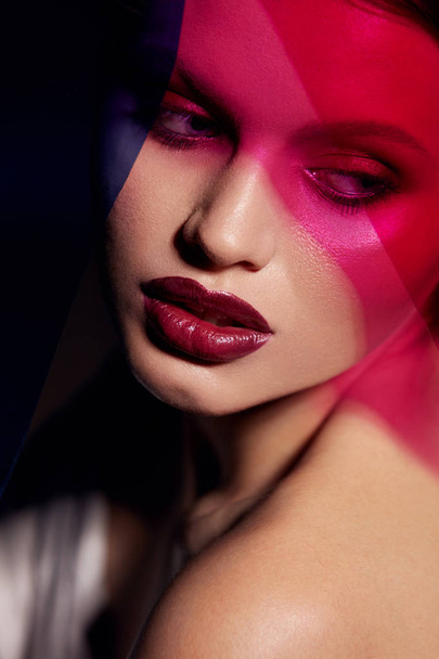 Beauty face makeup. Fashion portrait of girl model with lipstick - Foto, imagen