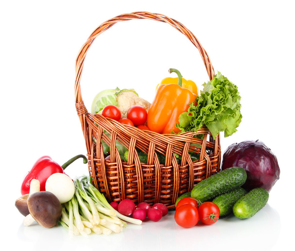 Fresh vegetables in wicker basket isolated on white - Фото, изображение