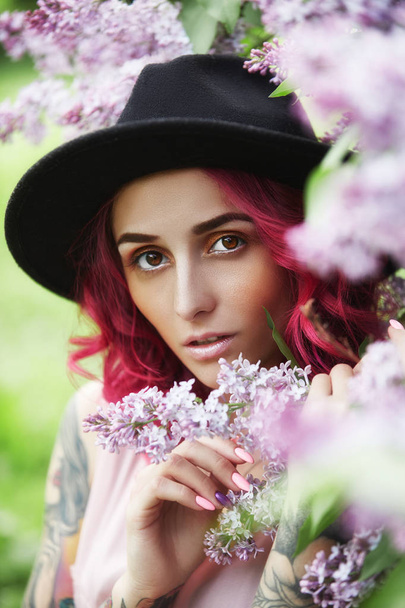Fashion girl with red hair vocation, spring portrait in lilac co - Фото, зображення